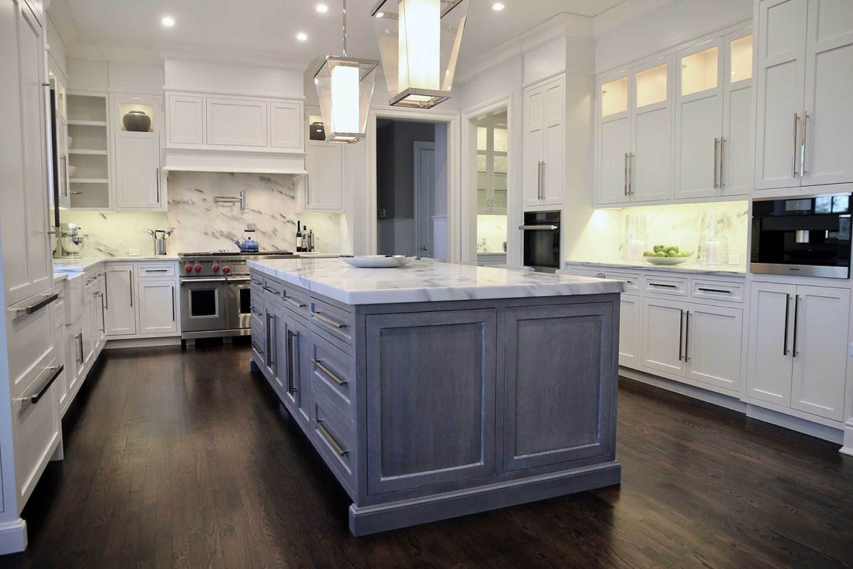 Grey Kitchen Island and White Cabinets