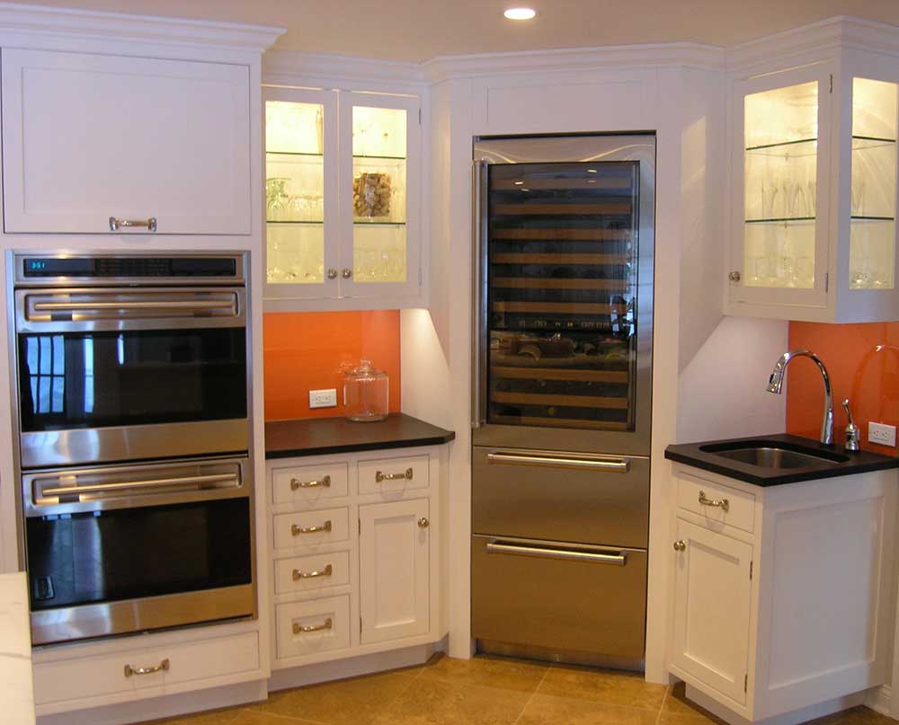 White Kitchen Cabinets with Stove and Large Wine Cooler
