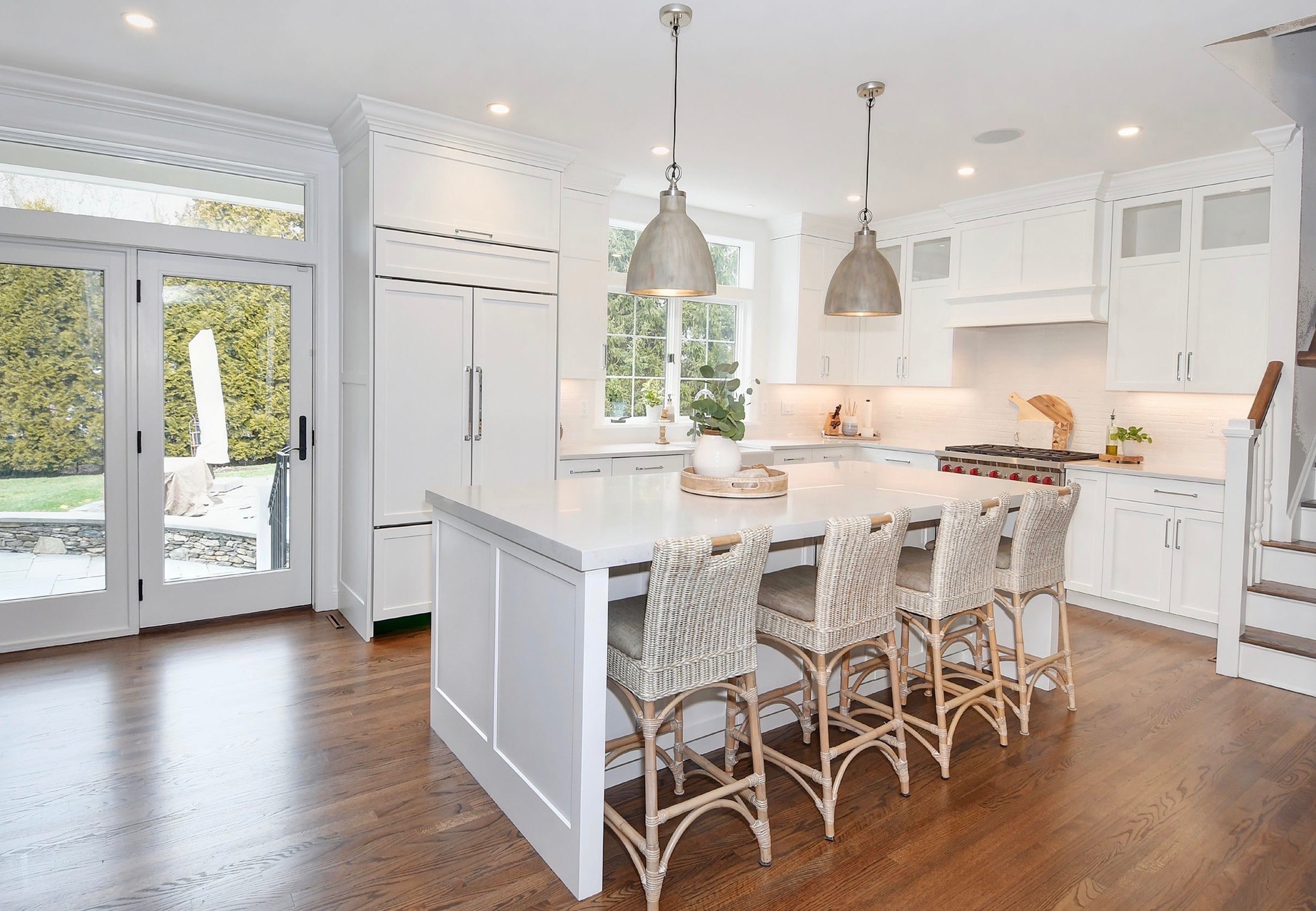 Angeld Shot of Kitchen with White Cabinets and Island