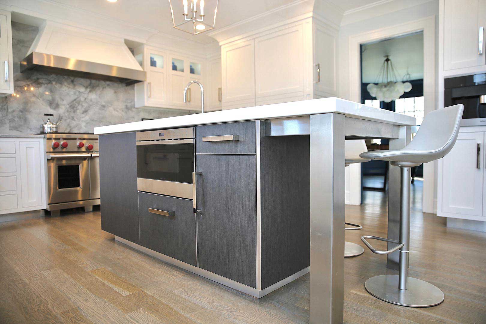 Grey Kitchen Island with Cabinets and Built-in Stove