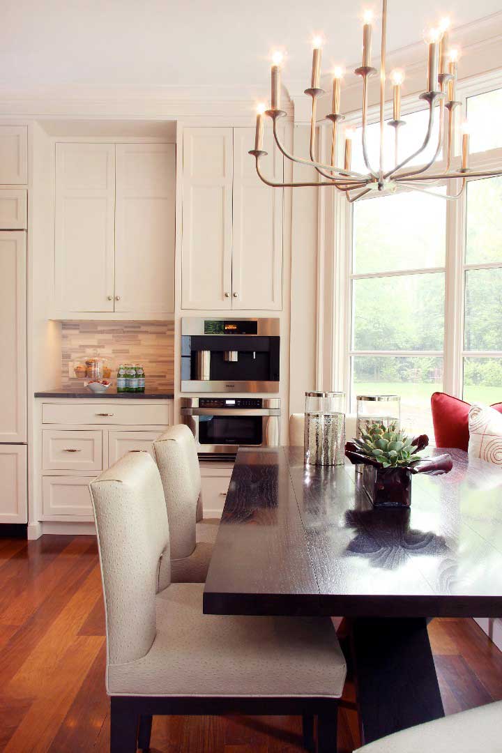Kitchen Dining Table with White Cabinets in Background